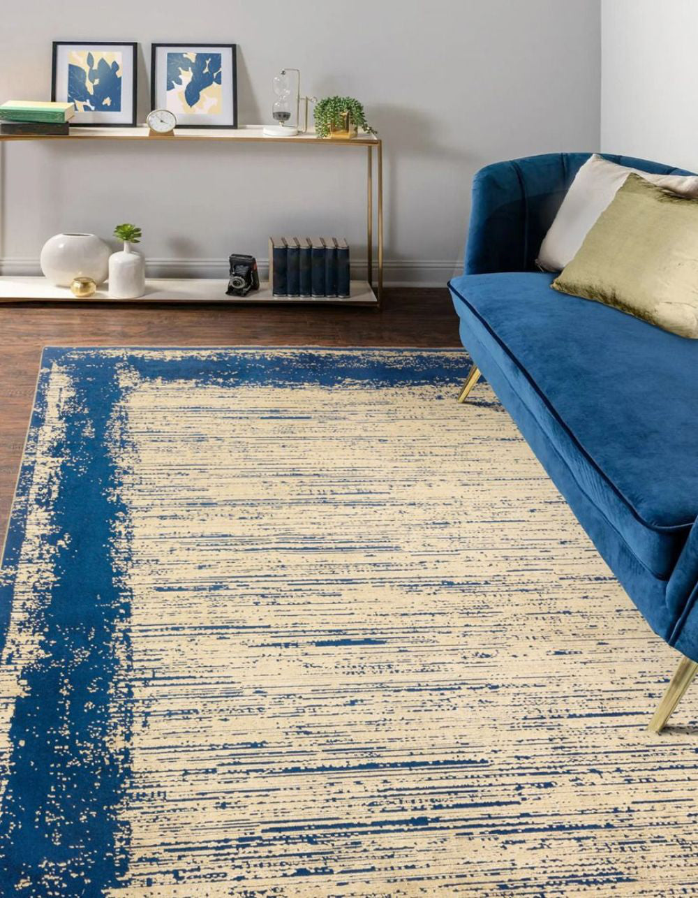 Koa Twilight and Gold Rug with Sofa and Side Table in Living Room Setting