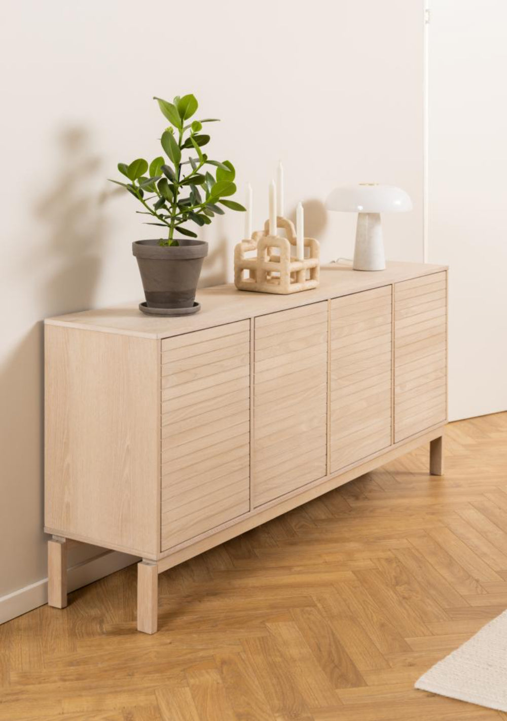 Lacey 4 Door Sideboard with Indoor Plant in Dining Setting