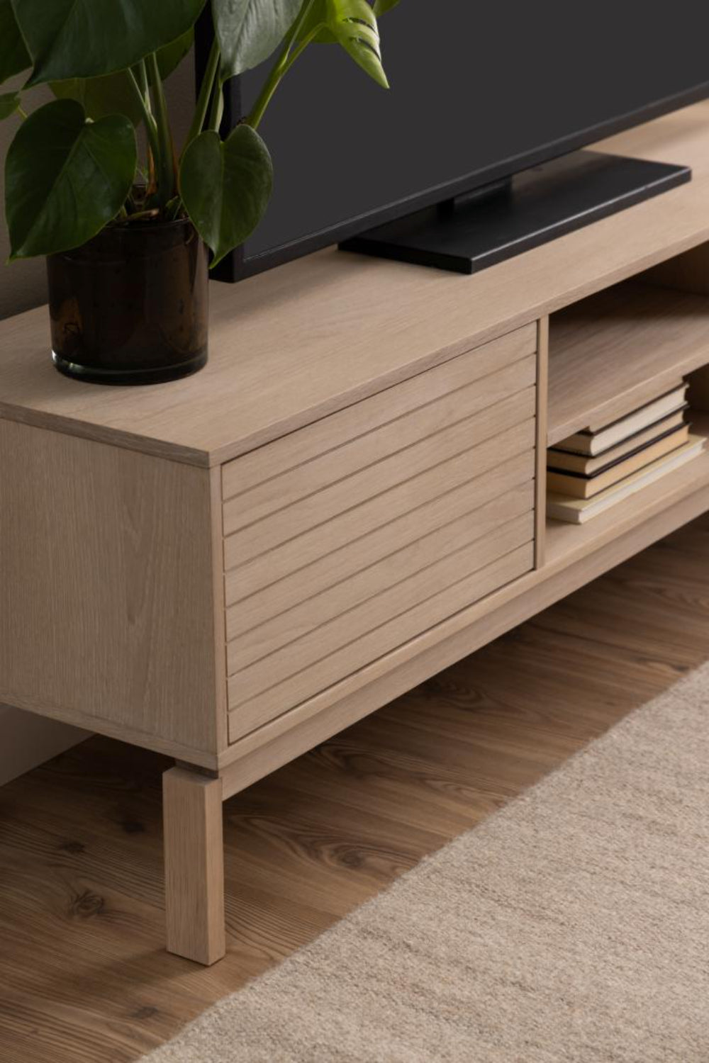 Lacey Wooden Media Unit with Indoor Plant in Living Room Setting