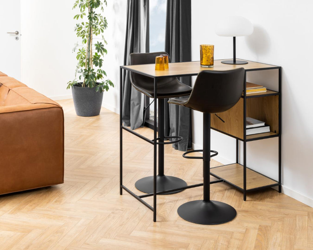 Leo Height Adjustable Barstool in Black Finish with Indoor Plant and Hightop Table in Living Room Setting