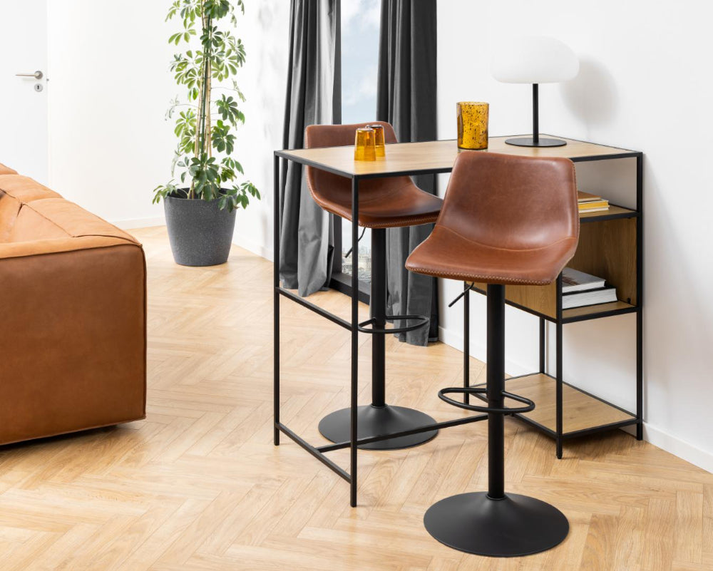 Leo Height Adjustable Barstool in Brandy Finish with Indoor Plant and Hightop Table in Living Room Setting 2