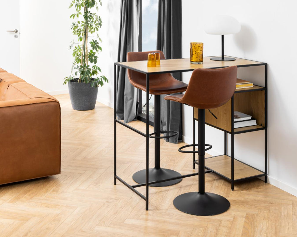 Leo Height Adjustable Barstool in Brandy Finish with Indoor Plant and Hightop Table in Living Room Setting