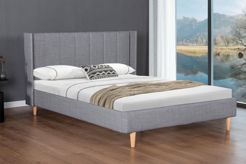 Lettie Bed Frame in Grey Finish with Pillows and Sheet in Bedroom Setting