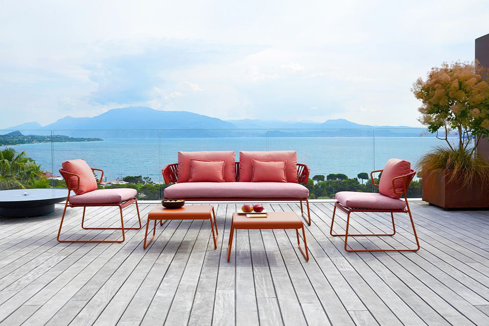 Lisa Outdoor Sofa Club with Coffee Table and Armchair in Outdoor Setting