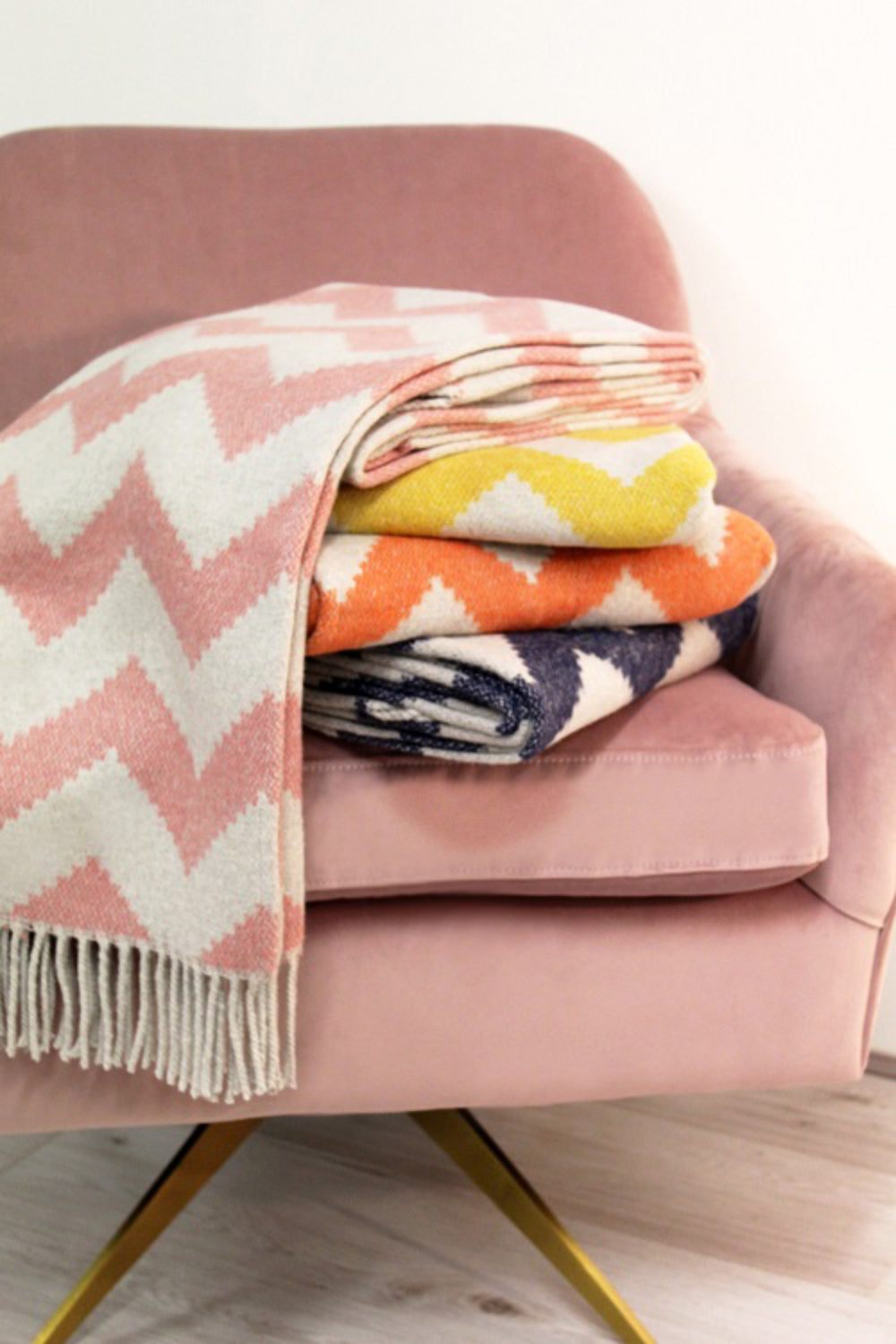 Lounge Chair with Aria Fringed Throw in Living Room Area