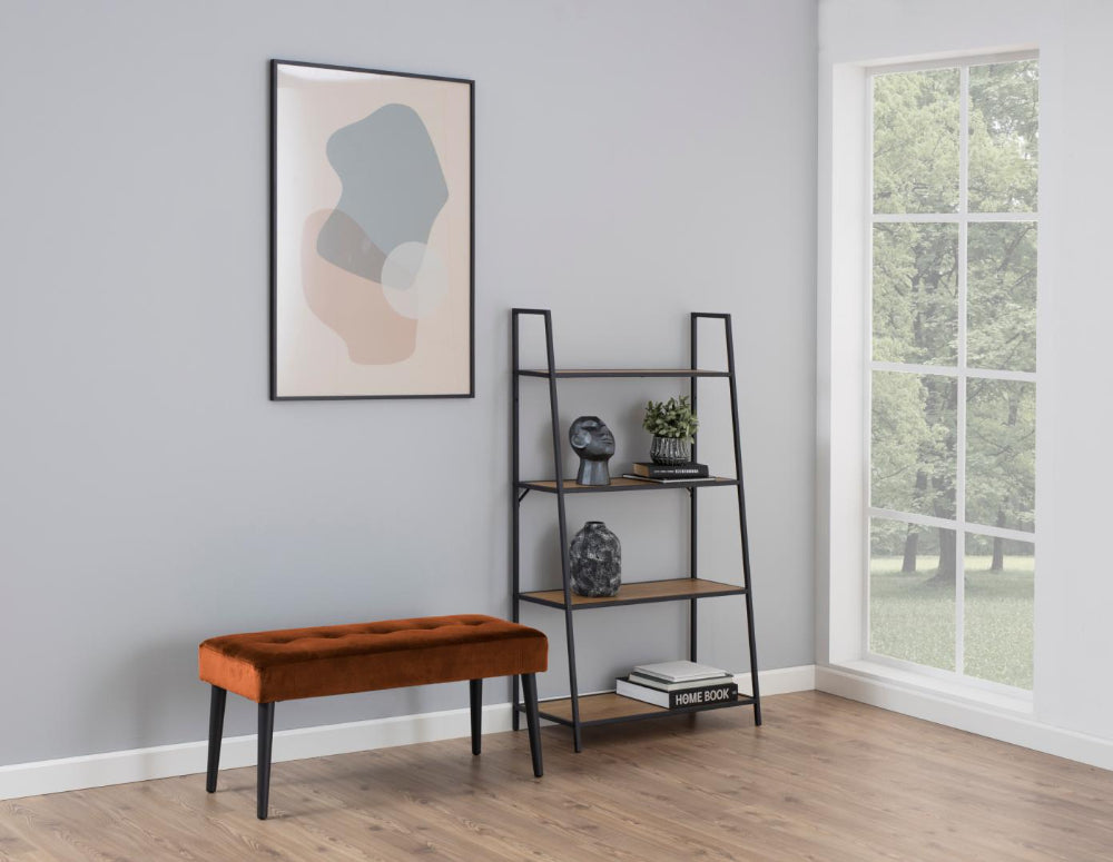 Lumina Upholstered Bench in Copper Finish with Bookshelves and Books in Living Room Setting