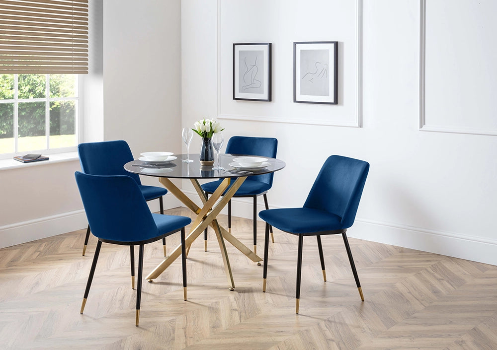 Luna Dining Chair in Blue Finish with Round Glass Top Table and Wall Frame in Breakout Setting