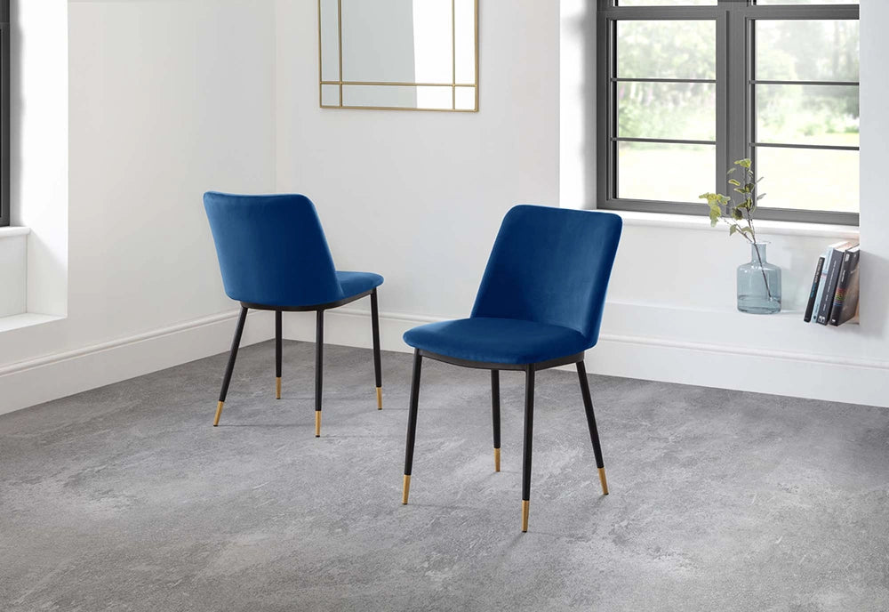Luna Dining Chair in Blue Finish with Transparent Vase and Books in Breakout Setting