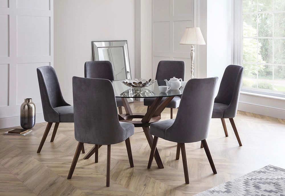 Lux Round Dining Table in Walnut Finish with Standing Lamp and Upholstered Chairs in Breakout Setting