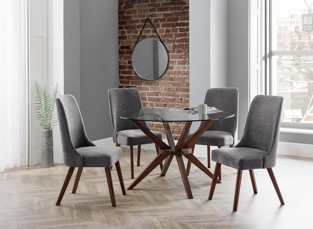 Lux Round Dining Table in Walnut Finish with Upholstered Chairs and Round Mirror in Breakout Setting