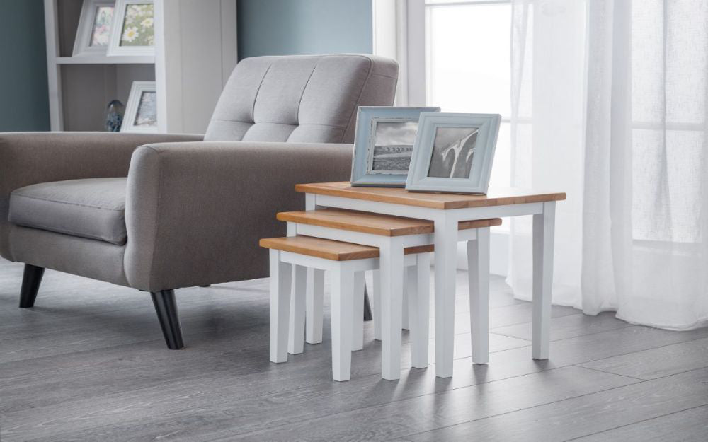 Lyon Nest Of Tables White and Oak with Picture Frame and Armchair in Living Room Setting