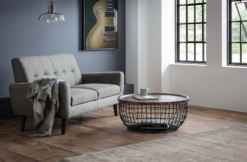 Marcus Storage Coffee Table in Wooden Top Finish with Upholstered Grey Sofa in Living Room Setting