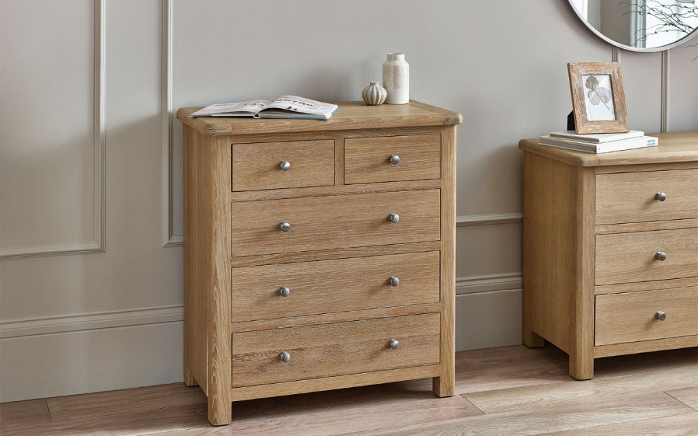 Marissa 3 2 Drawer Chest in Limed Oak Finish with Magazine in Bedroom Setting