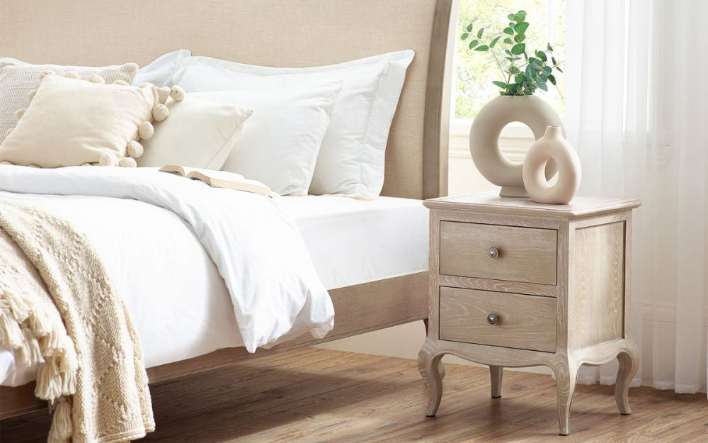 Marseille 2-Drawer Bedside Table with Bed and Vase in Bedroom Setting