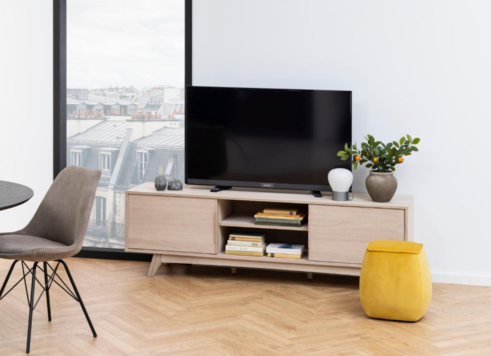 Milo Wooden Media Unit with Pouffe and Chair in Living Room Setting