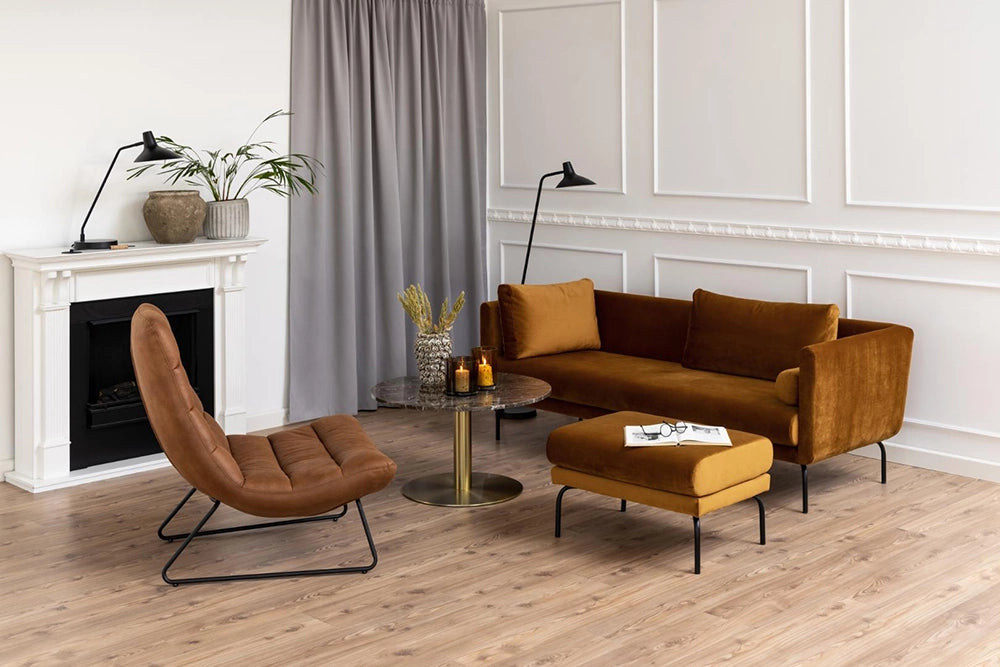 Mindy Lounge Chair in Brandy Finish with Upholstered Sofa and Standing Lamp in Living Room Setting