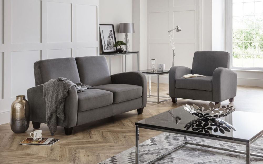 Monza Sofa Bed in Dusk Grey Chenille with Armchair and Lamp Shade in Living Room Setting