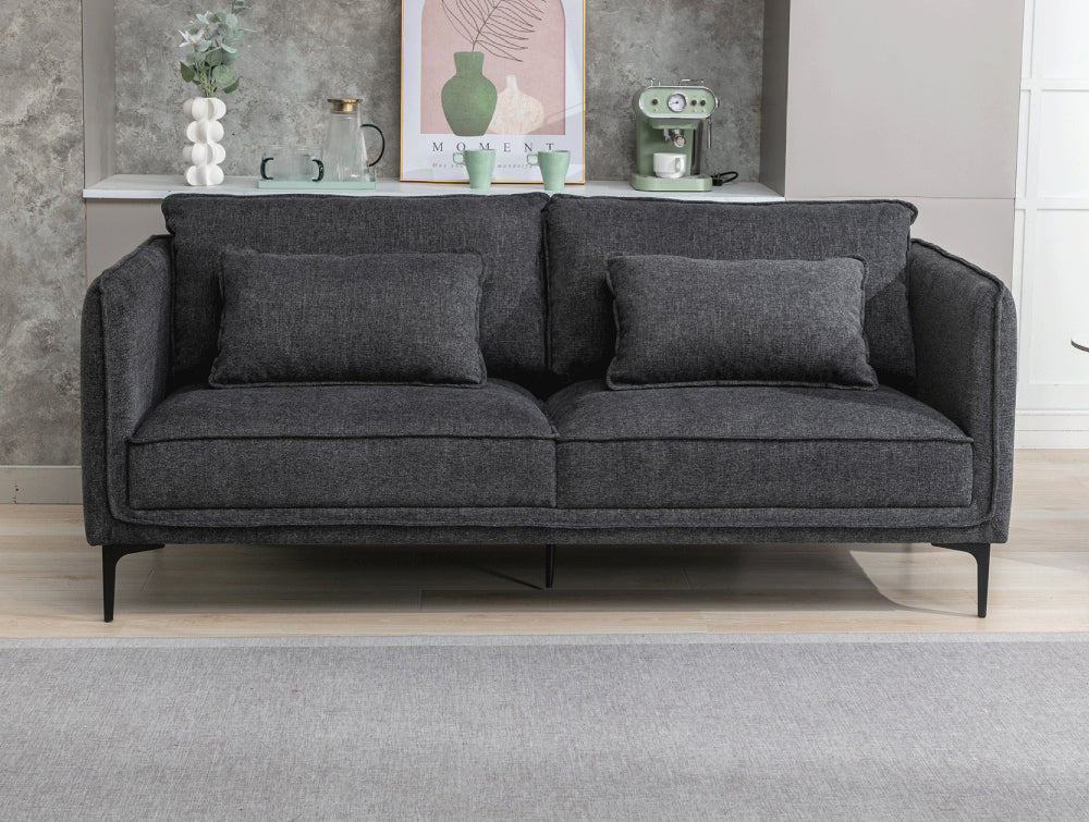 Norris 3 Seater Sofa in Dark Grey Finish with Side Table and Floor Rug in Living Room Setting 2