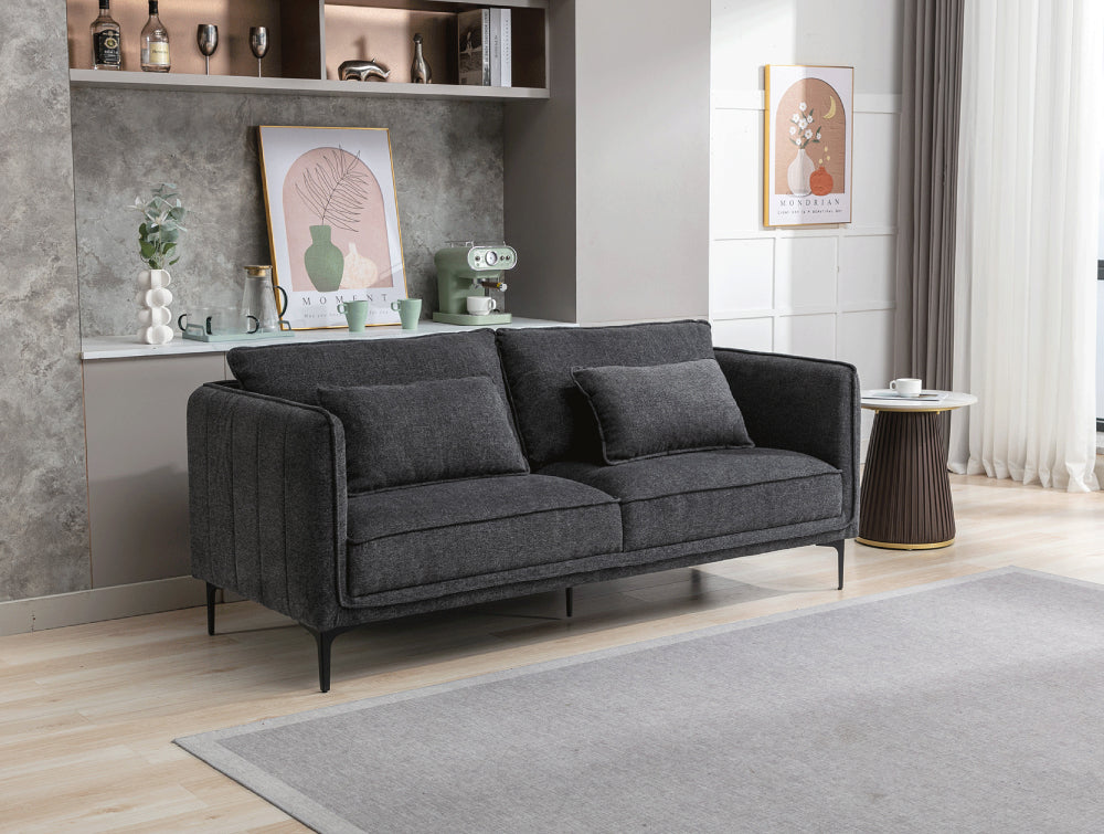 Norris 3 Seater Sofa in Dark Grey Finish with Side Table and Floor Rug in Living Room Setting