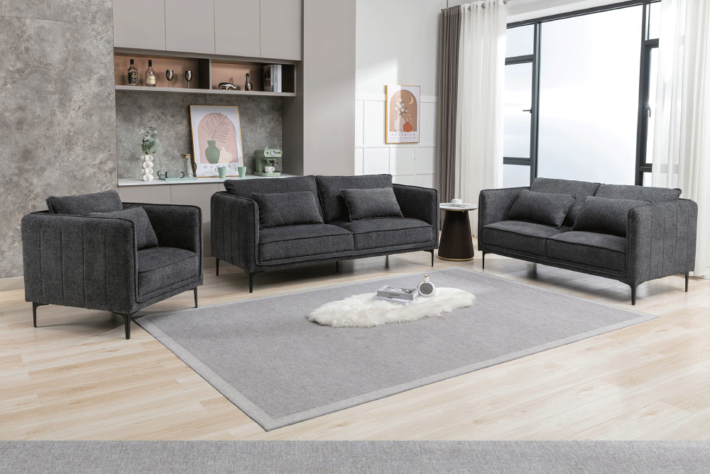 Norris Sofa in Dark Grey Finish with Side Table and Floor Rug in Living Room Setting