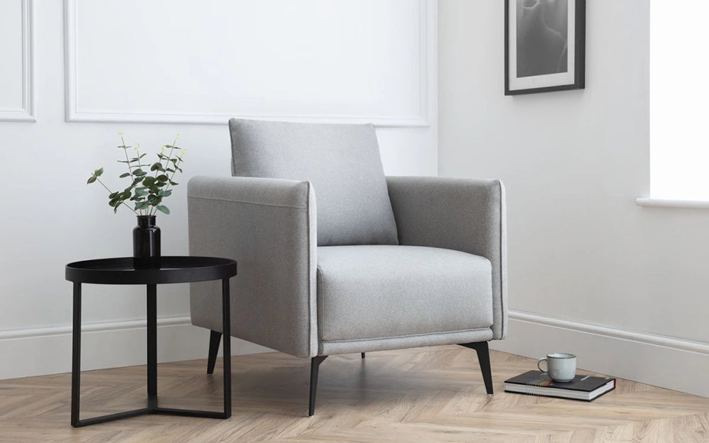 Ohio Fabric Armchair in Grey Finish with Round Top Coffee Table and Small Tea Cup in Living Room Setting