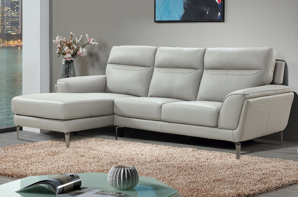 Oliver Corner Group Sofa LHF in Light Grey Finish with Vase and Floor Rug in Living Room Setting