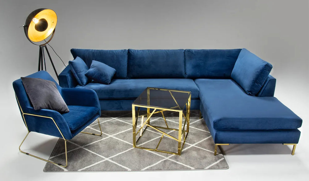 Oslo Armchair in Blue Finish with Modular Sofa and Coffee Table in Studio Setting
