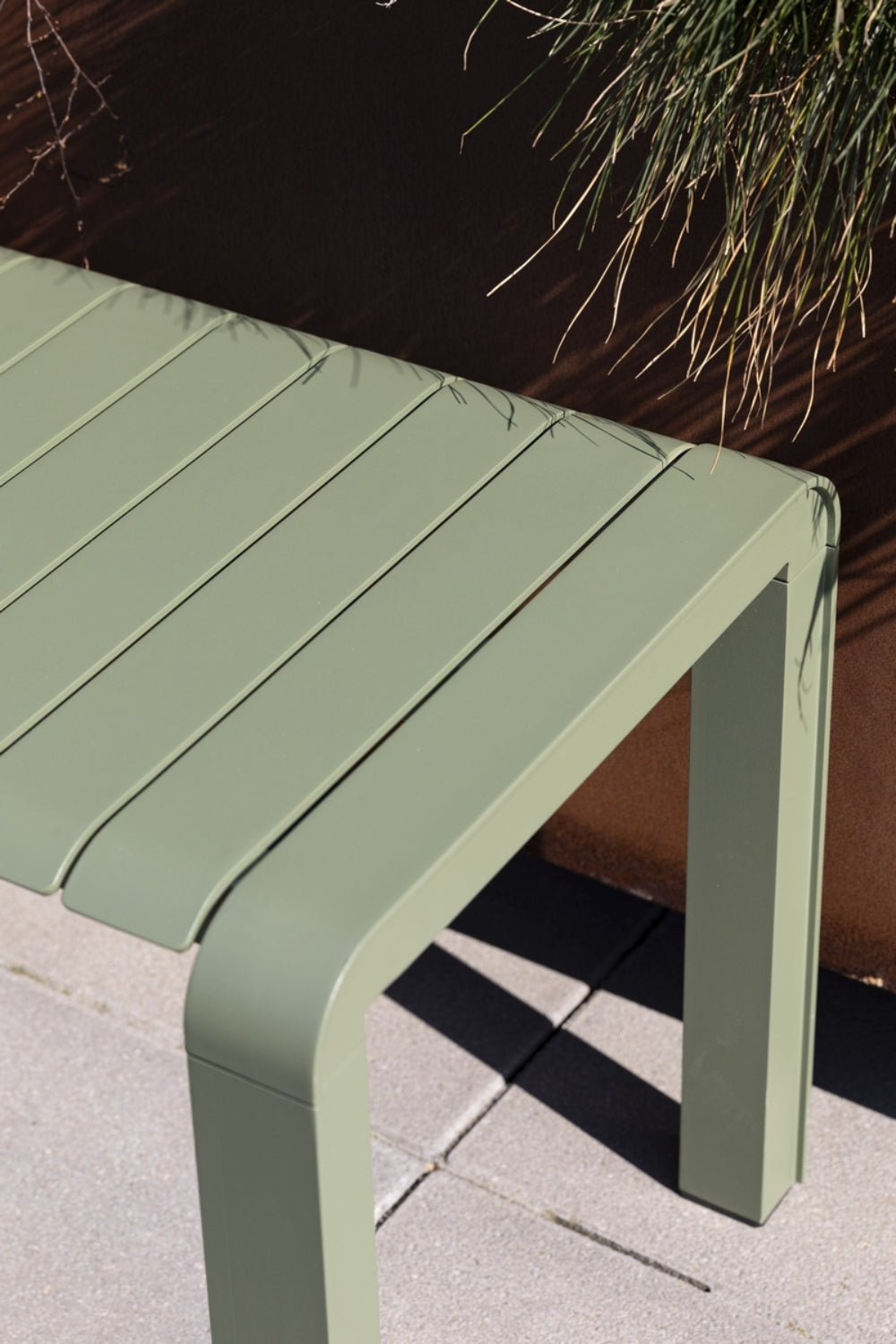 Portia Outdoor Bench 1295x450 Green Top Detail in Outdoor Setting