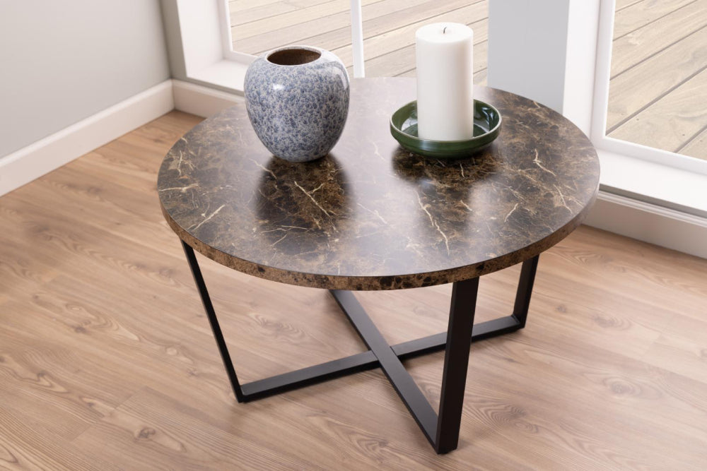 Ramble Round Coffee Table in Brown Marble Finish with Candle and Antique Vase