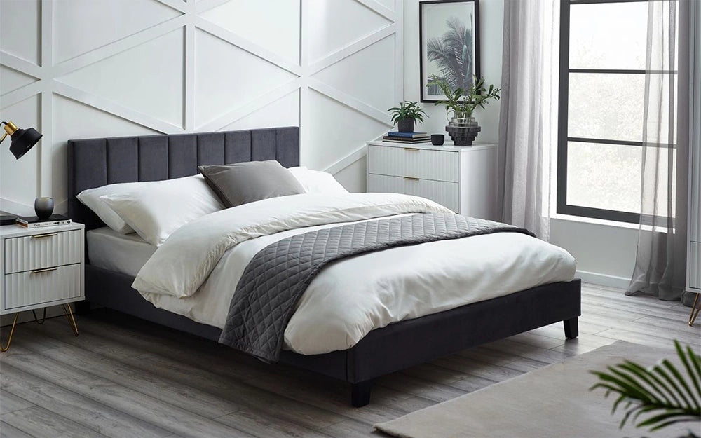 Rosina Velvet Single Size Bed In A Box in Grey Finish with Black Table Lamp and White Cupboard in Bedroom Setting