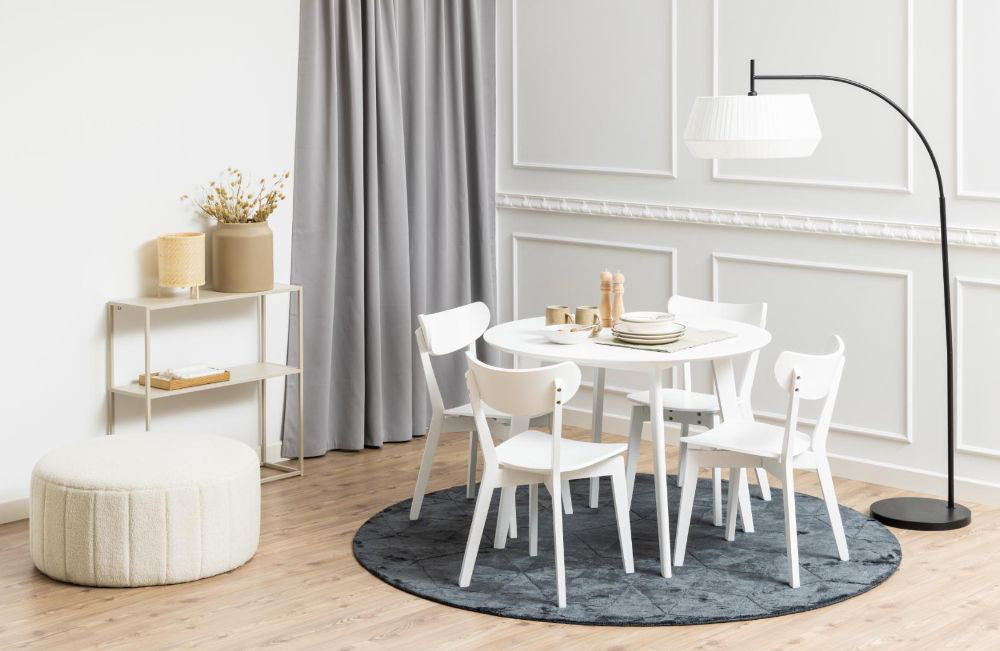 Sierra Round Dining Table White with Floor Lamp and Pouffe in Breakout Setting