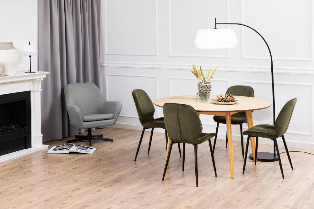 Sierra Round Dining Table in Veneered in Oak Top Finish with Chairs and Standing Lamp in Dining Setting