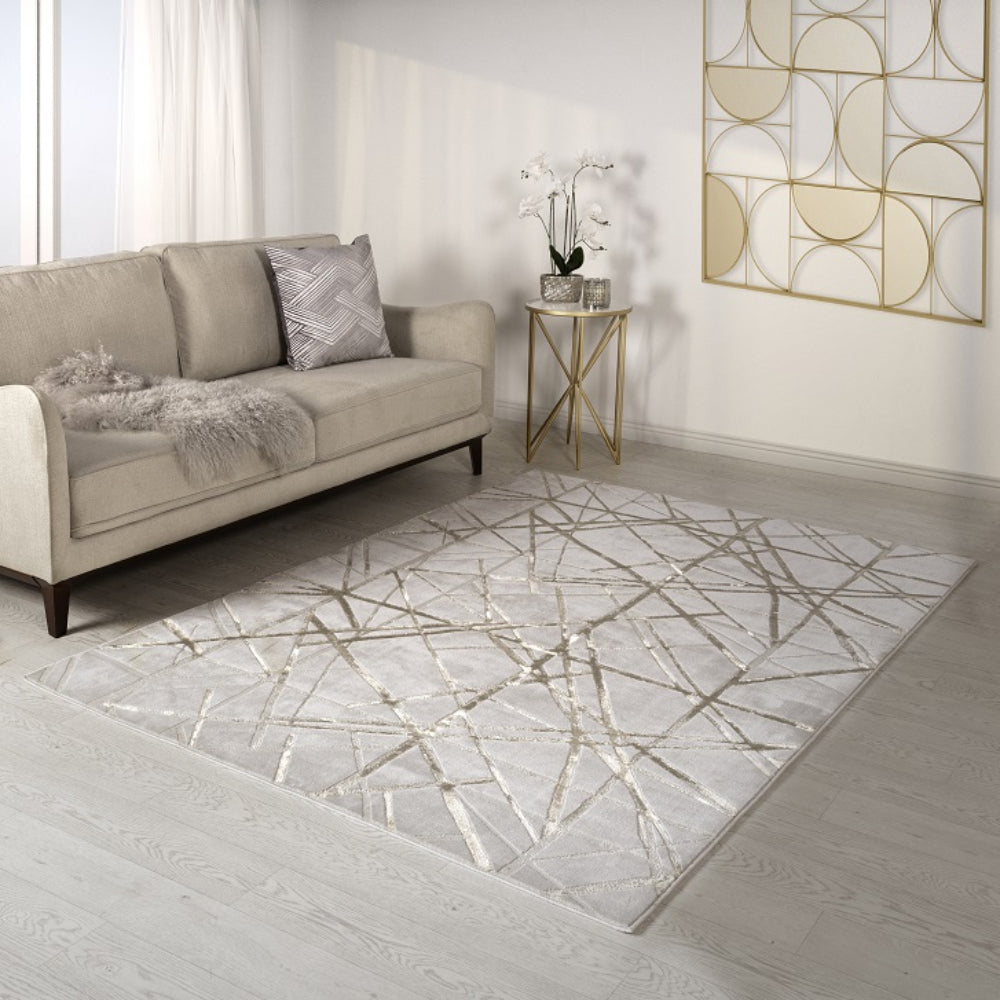 Skylar Metallic Geometric Rug with 2 Seater Sofa in Living Room Setting