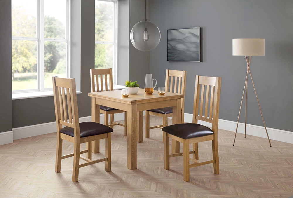 Tori Extending Dining Table in Wooden Finish with Padded Wooden Chair and Standing Lamp in Breakout Setting