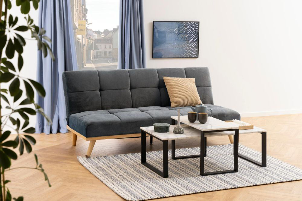 Trina Coffee Table Polished Marble and Black with Sofa and Floor Rug in Living Room Setting