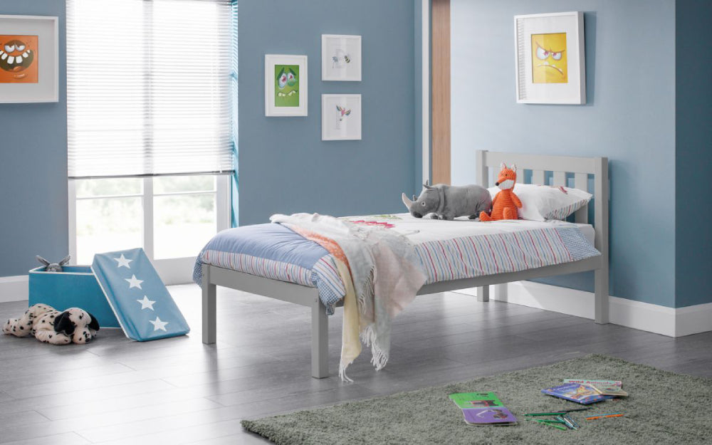 Una 3"0' Bedframe in Dove Grey Finish with Toys and Frames in Bedroom Setting