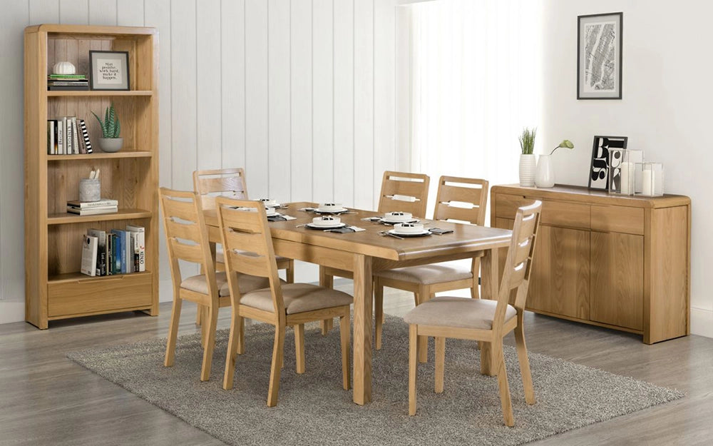 Vault Oak Dining Table with Wooden Chairs and Bookshevles in Dining Setting