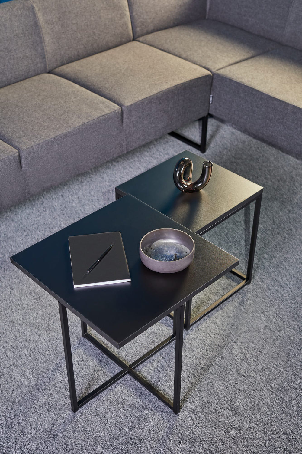 Verso-Upholstered-Modular-Sofa-in-Grey-Finish-with-Black-Coffee-Table-in-Living-Room-Setting